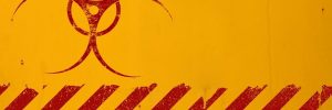 Red Biohazard Symbol on Yellow Background